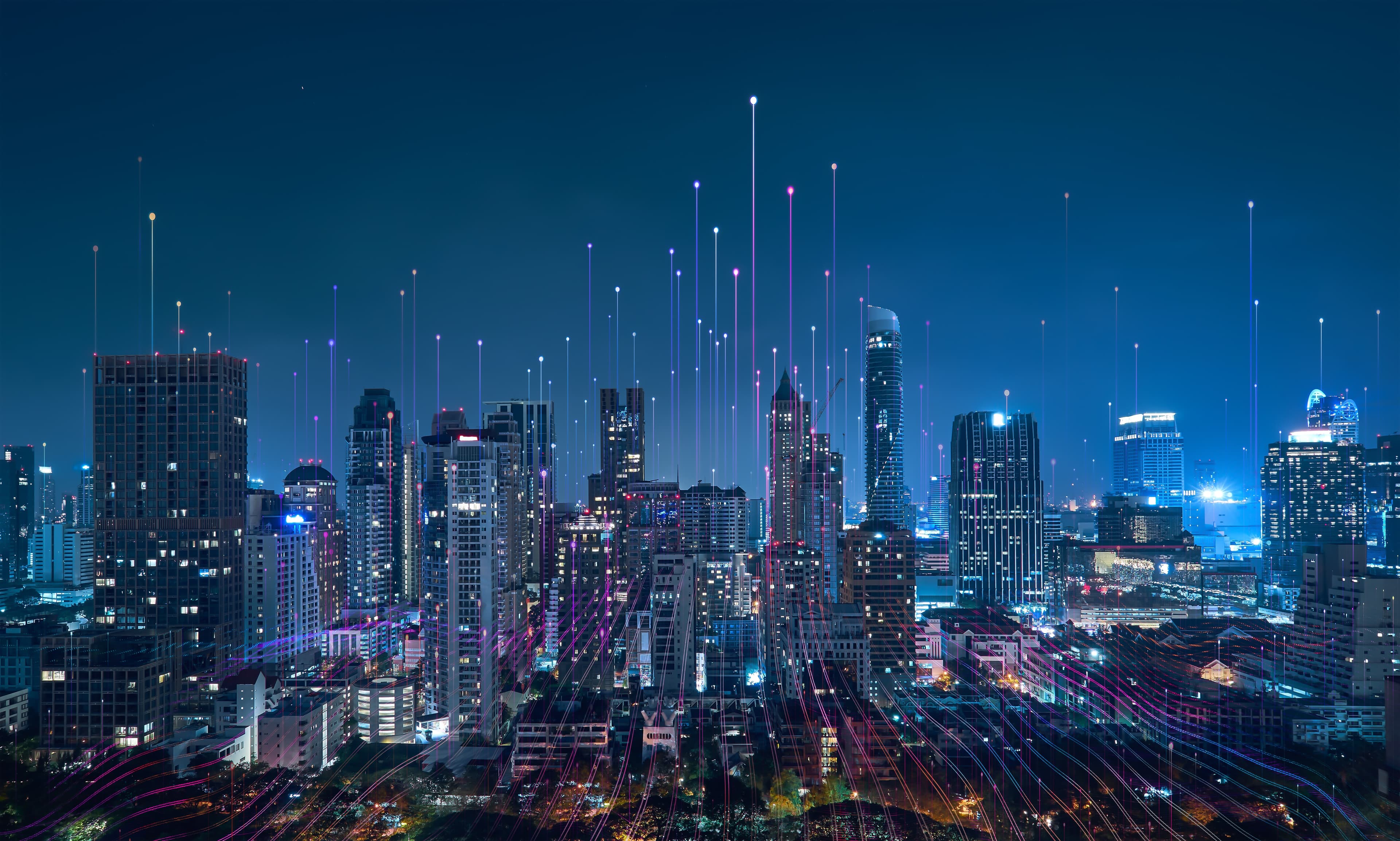 Smart city network skyline at dusk